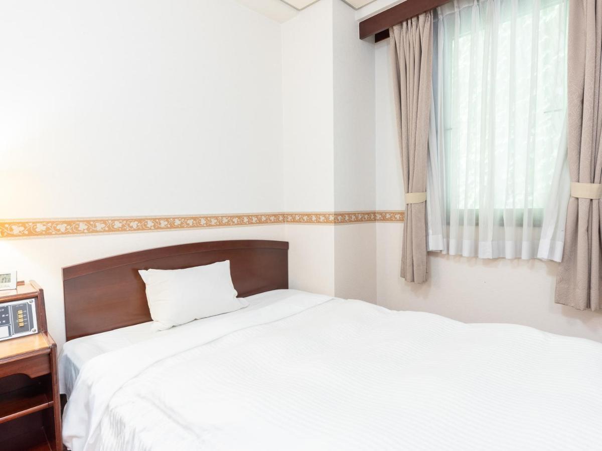 Amuze Hotel Sakuragicho Toyama Station Værelse billede